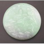 A Chinese Pale Green and White Jade Circular Pendant with Village Decoration. 5cm diameter.