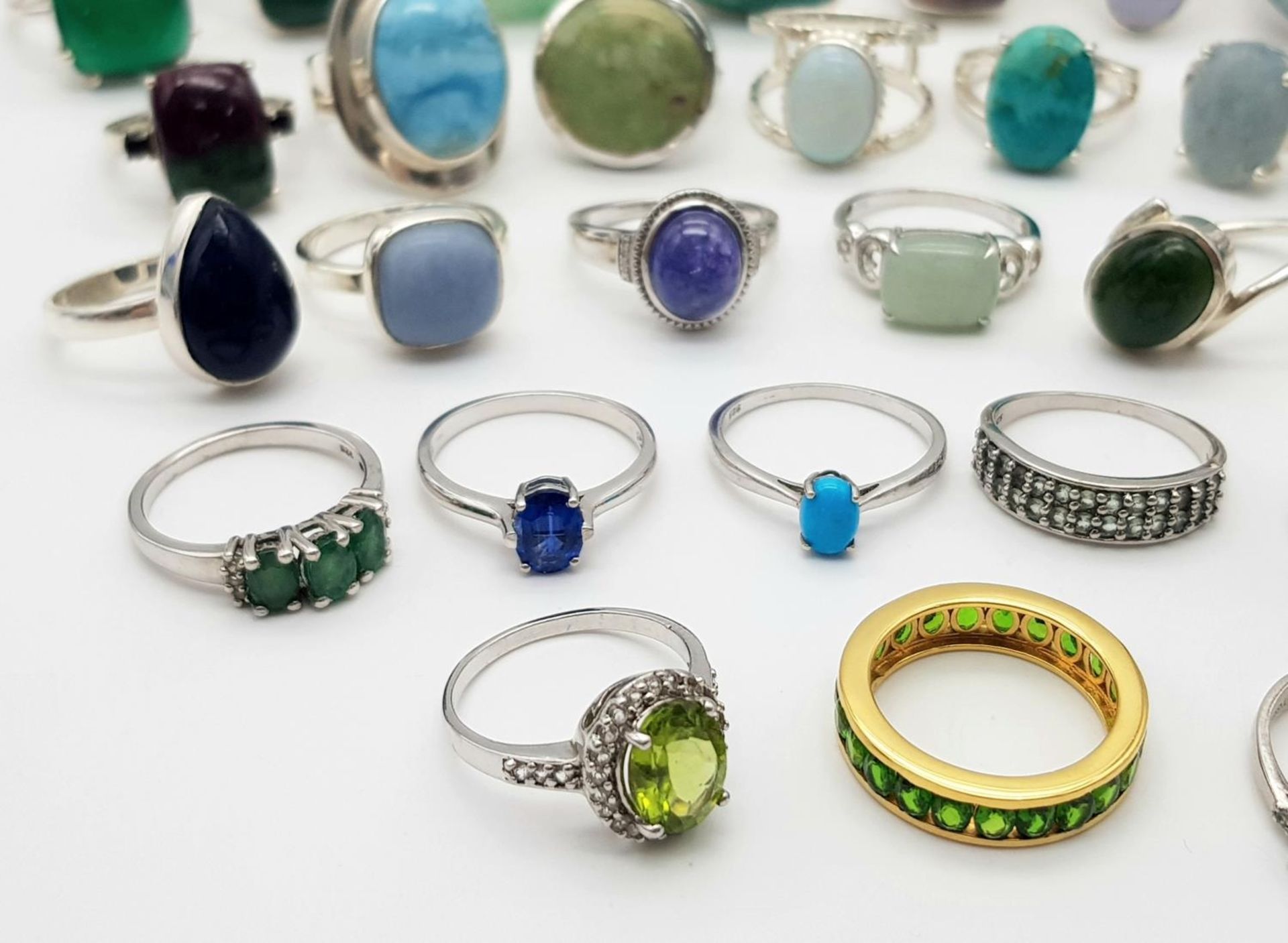 An impressive collection of forty sterling silver rings in a variety of designs. all adorned with - Image 4 of 7