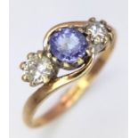 A 9K Yellow Gold Sapphire and Diamond Ring. Size K, 1.6g total weight.