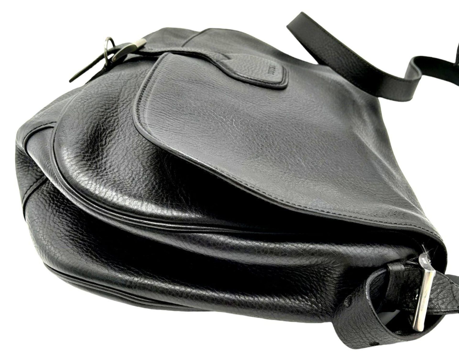 A Prada Black Leather Crossbody Satchel Bag. Textured exterior with buckled flap. Spacious leather - Image 5 of 14