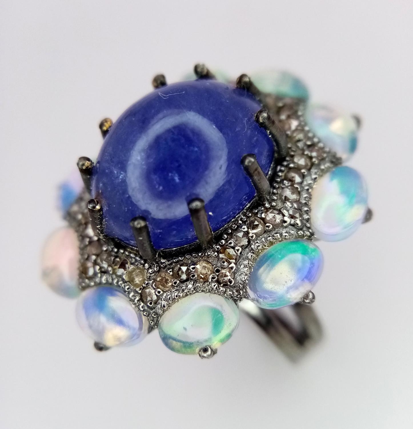 A 10ct Tanzanite Gemstone Dress Ring with 3ctw Opal Surround and 0.50ctw of Diamond Accents. Size N. - Image 3 of 5