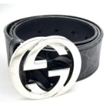 A Gucci Black with Grey Monogram Men's GG Belt. Silver-toned hardware. Approximately 104.5cm length,