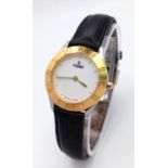 A Fendi Designer Quartz Ladies Watch. Black leather strap. Gilded circular case - 26mm. In working