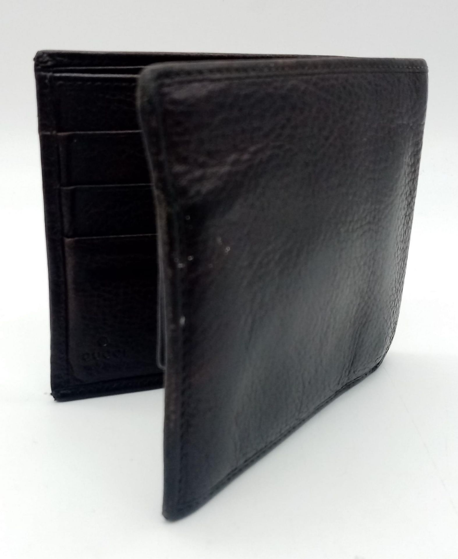 A dark brown leather Gucci card wallet, 3 card holders with a popper pocket. Size approx. - Image 2 of 6