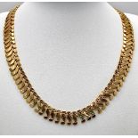 A Wonderful 18K Yellow Gold Serpentine Link Necklace with a Snakes Head Clasp! 42cm length. 37.71g