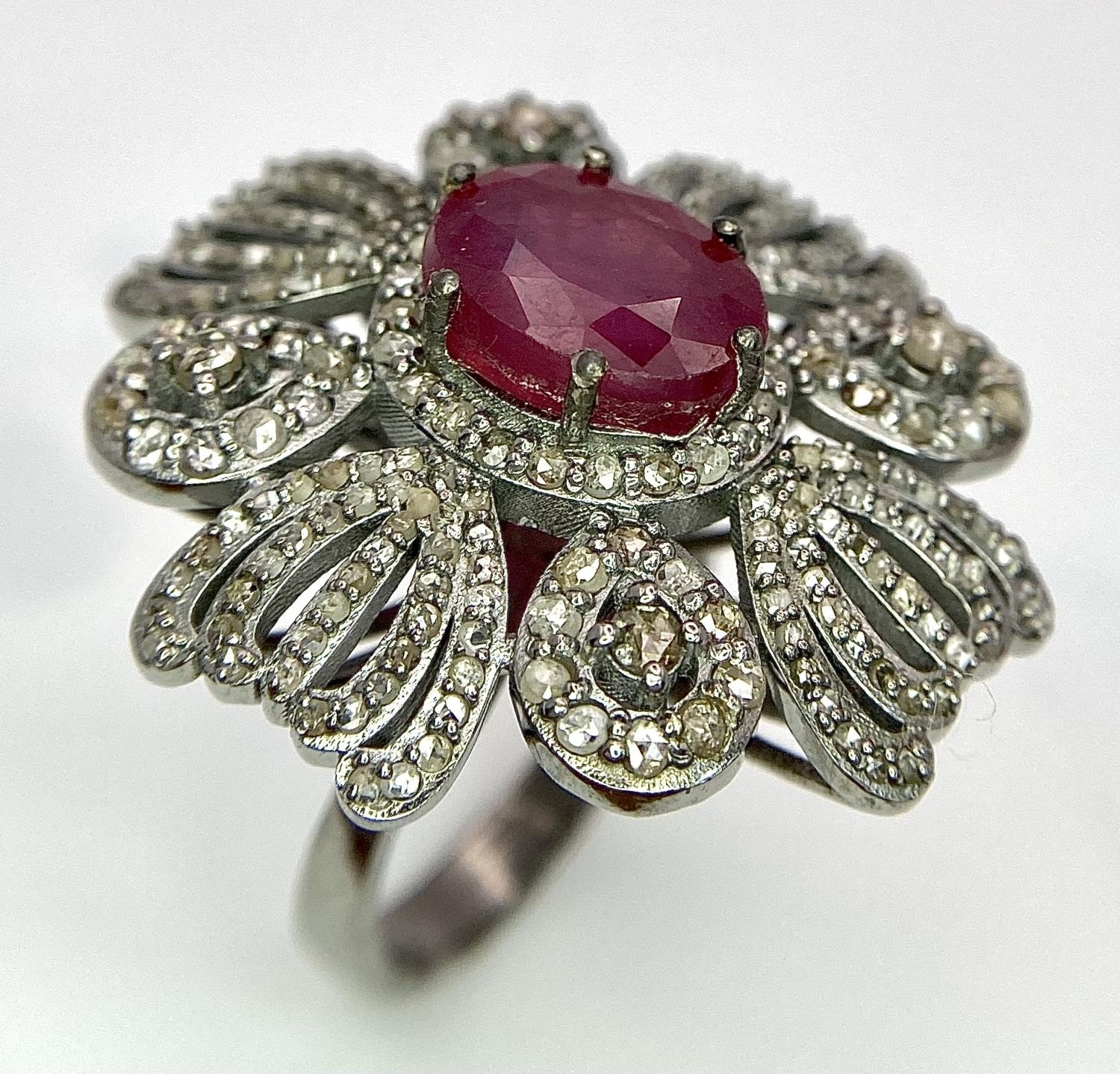 A 5ct Ruby Gemstone Cocktail Ring with 2ctw of Old Cut Diamond Decoration. Set in 925 Silver. Size - Image 2 of 6