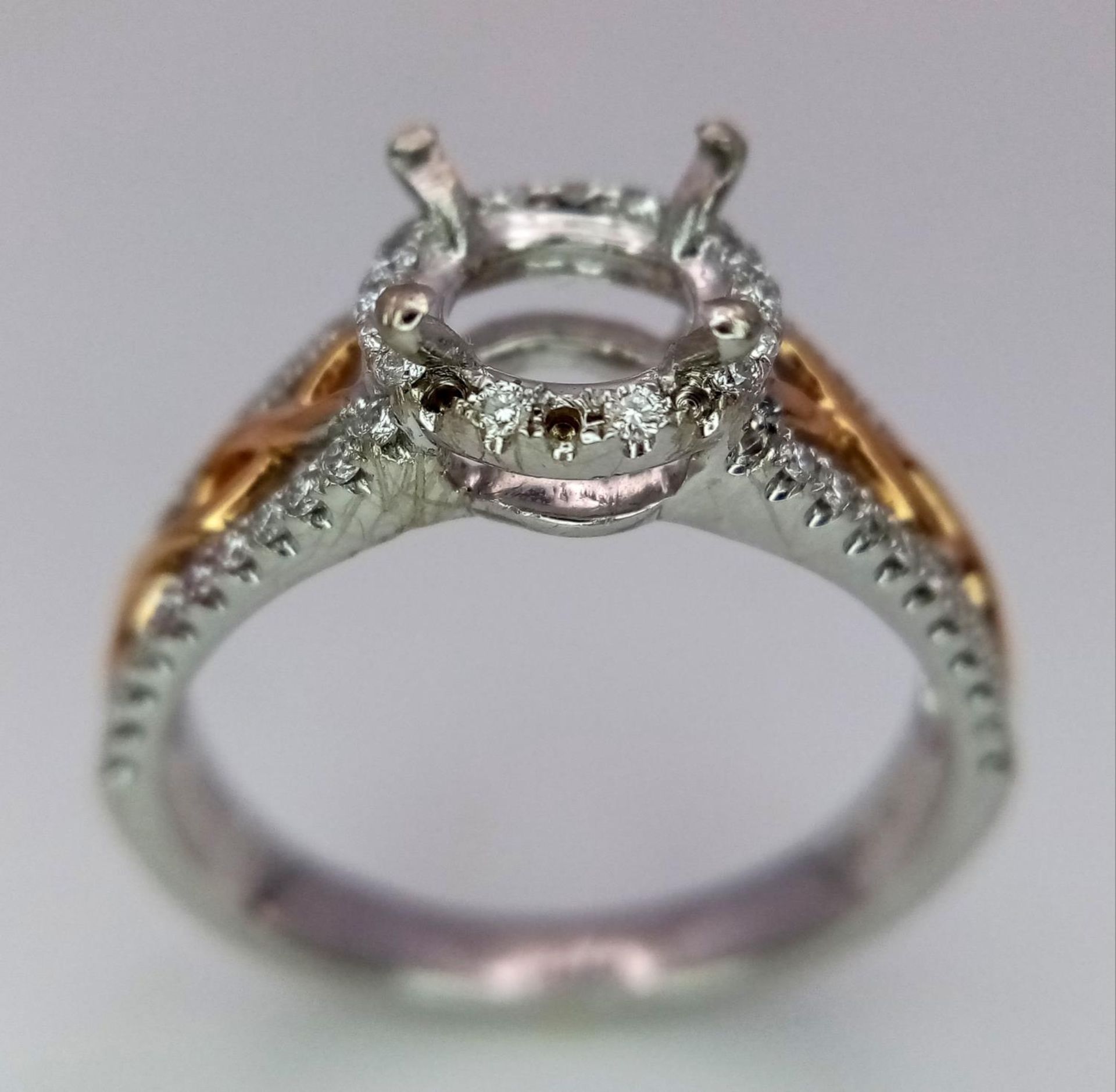 A 18K TWO GOLD TONE DIAMOND SET HALO RING WITH DIAMOND SPLIT SHOULDERS. 0.26CT DIAMONDS. READY TO - Image 2 of 8