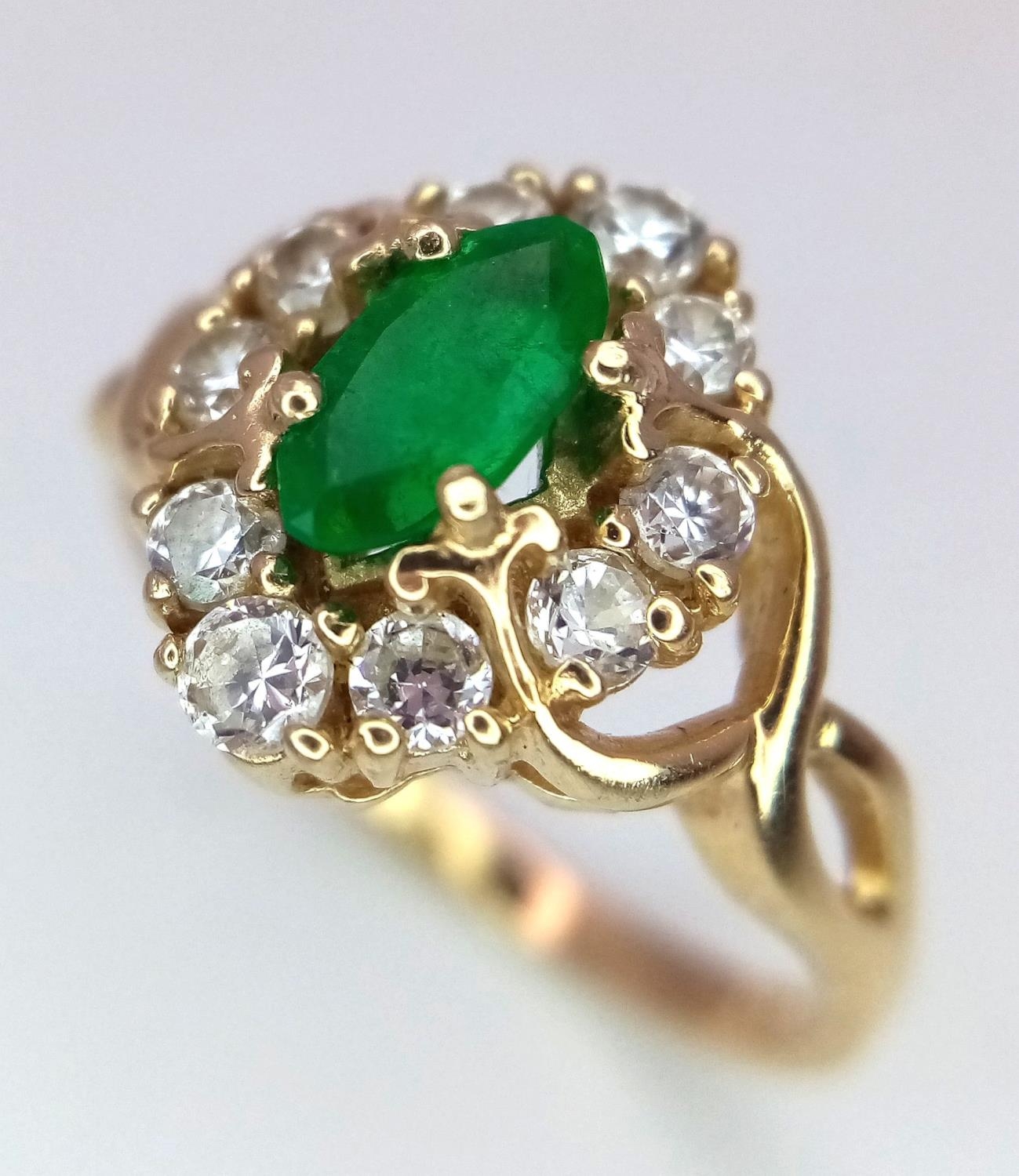 A 14K Yellow Gold Emerald and White Stone Ring. 1.2ct emerald. Size O, 3.34g total weight. - Image 3 of 5
