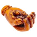 A Japanese Monkey Netsuke. Markings on base. 5cm