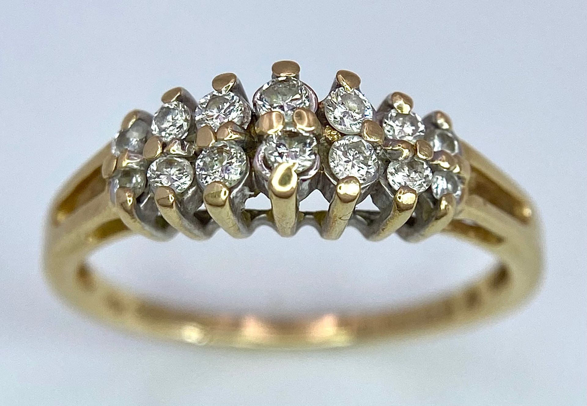 A 14K YELLOW GOLD 2 ROW DIAMOND RING. 0.25ctw, size N, 2.3g total weight. Ref: SC 9029