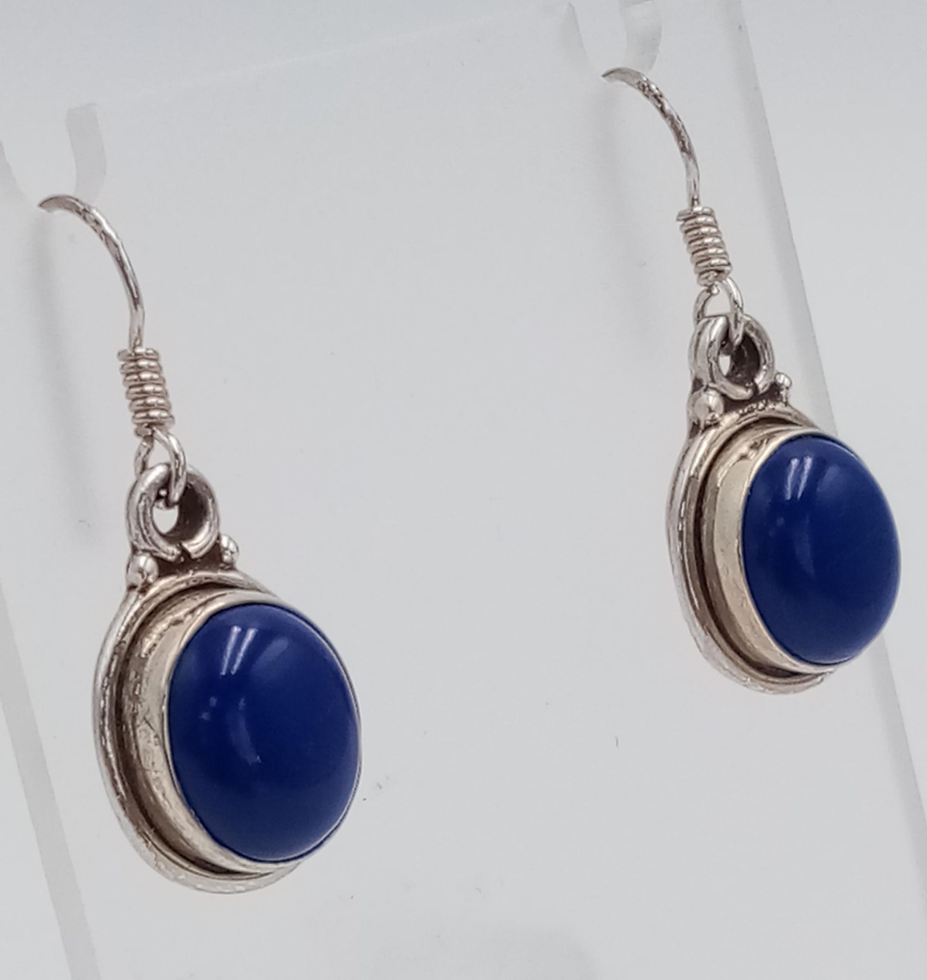 A Pair of Sterling Silver and Lapis Lazuli Cabochon Earrings. 3.4cm Drop. Set with 1.3cm Lapis
