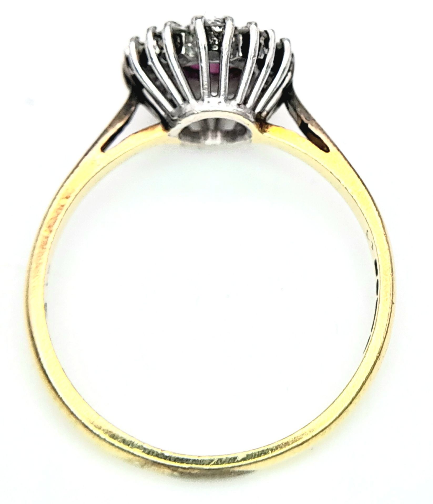 An 18K Yellow Gold, Ruby and Diamond Ring. Round cut ruby with a diamond halo. Size M 1/2. 2.8g - Image 6 of 8