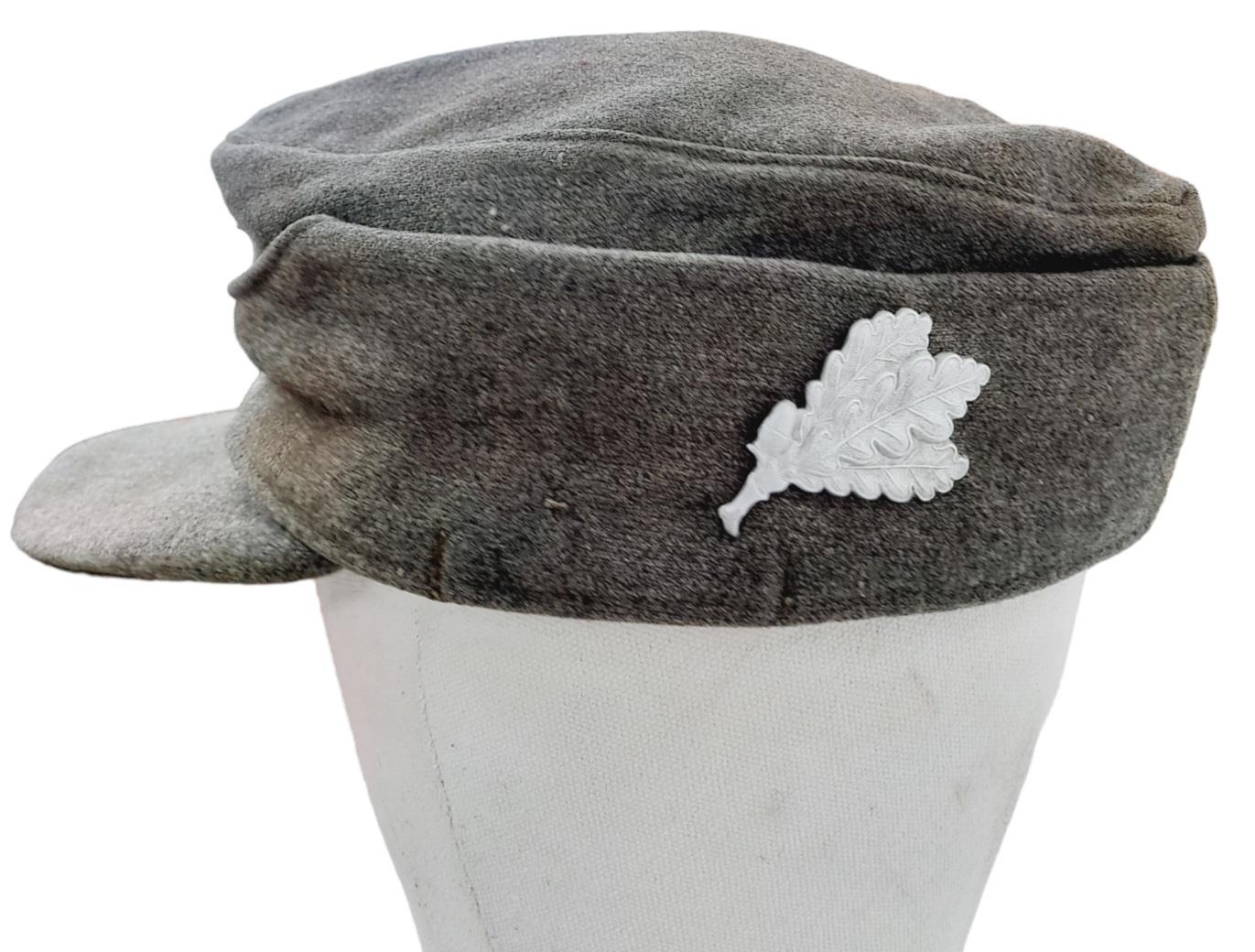 WW2 German M43 Cap with a “Jägers” Qualification Badge. The Jägers were an elite unit of Mountain