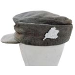 WW2 German M43 Cap with a “Jägers” Qualification Badge. The Jägers were an elite unit of Mountain