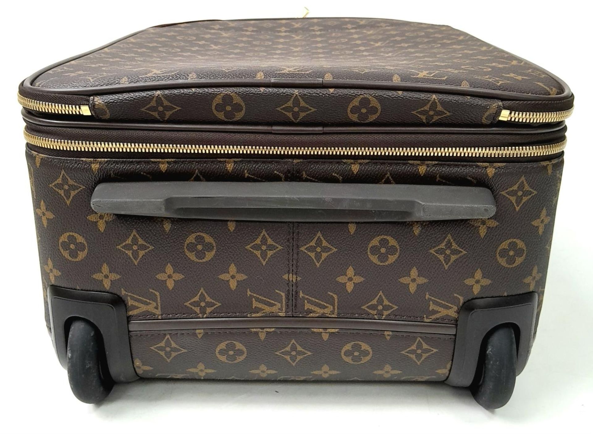 A Louis Vuitton Monogram Pegase Suitcase. Durable leather exterior with gold-toned hardware. Front - Image 5 of 16