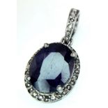 A Blue Sapphire and Rose cut Diamond Pendant. Set in 925 Sterling Silver. Sapphire - 4.30ct.