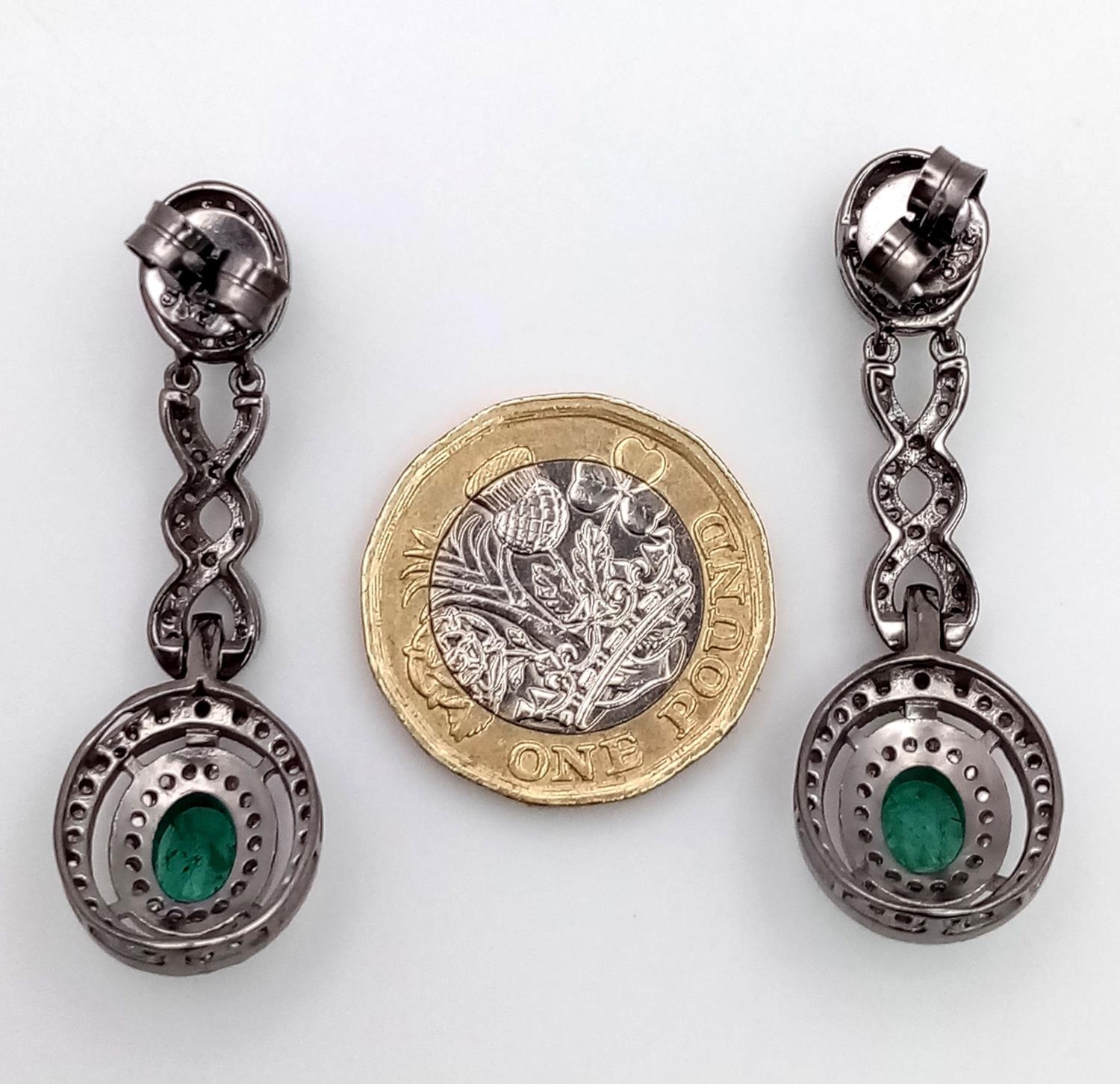 A Pair of Emerald Gemstone Drop Earrings with 3ctw of Emerald and Diamonds - 1.5ctw. Set in 925 - Image 4 of 6