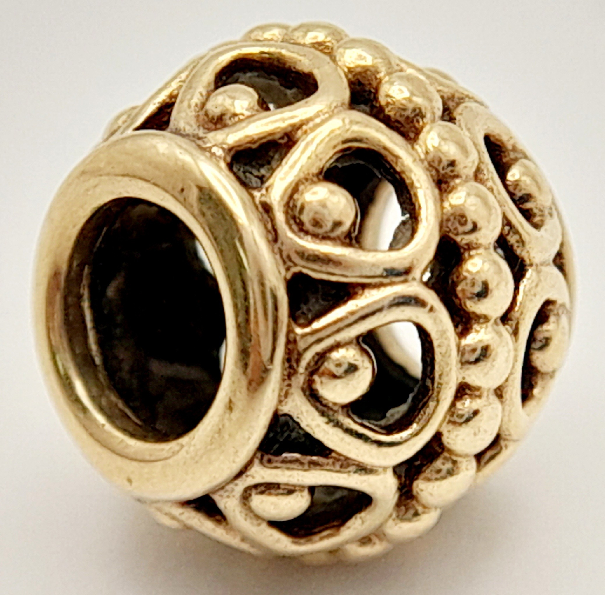 A 14K YELLOW GOLD PANDORA CHARM. 9mm length, 2.2g weight. Ref: SC 8135