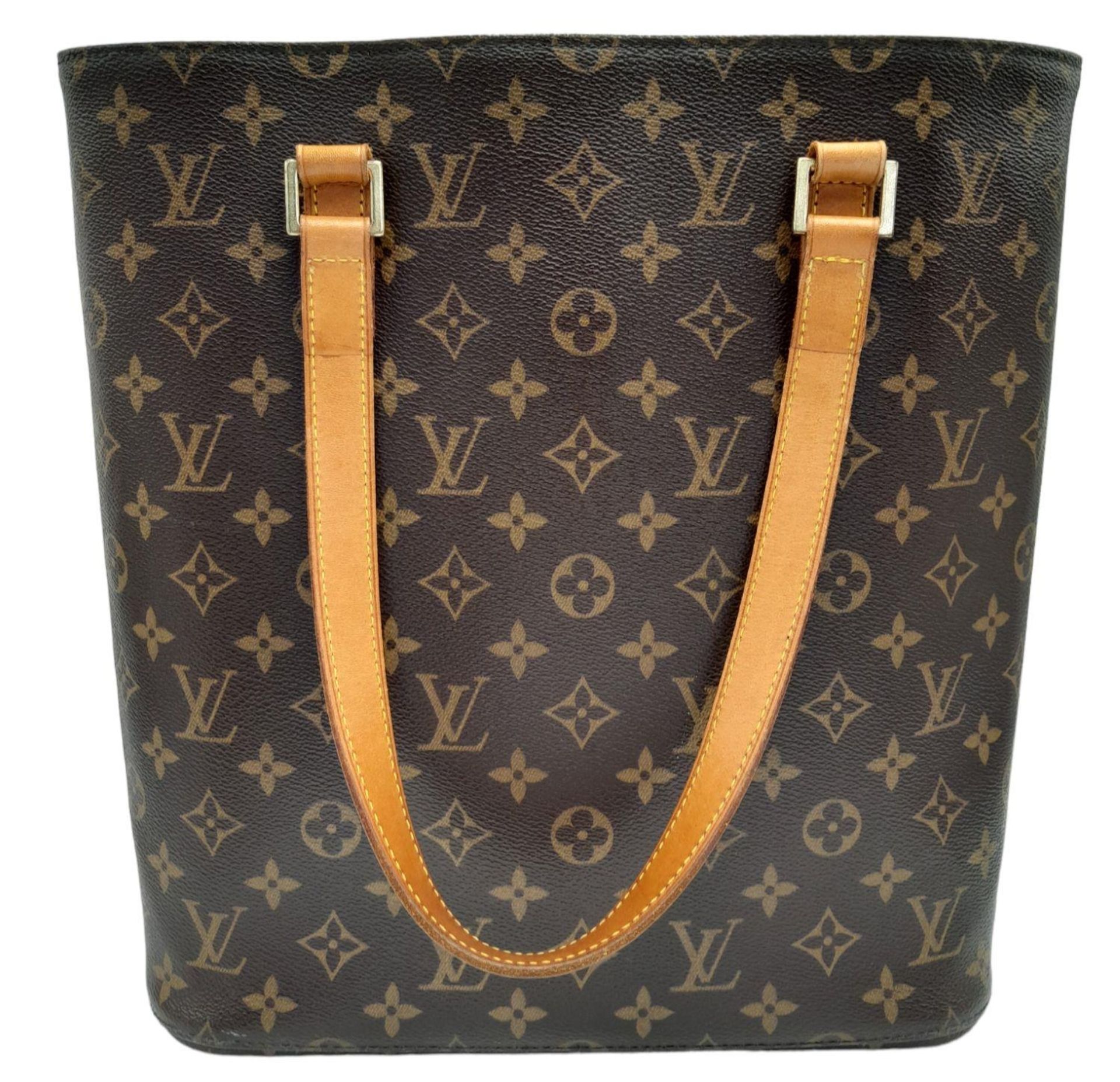 A Louis Vuitton Vavin GM Tote Bag. Monogramed canvas exterior with gold-toned hardware and two