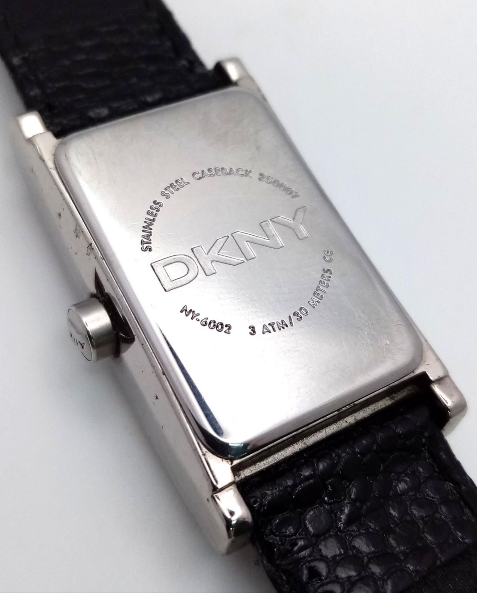 A DKNY Quartz Ladies Watch. Black leather strap. Stainless steel case - 24mm. Analogue/digital dial. - Image 3 of 6
