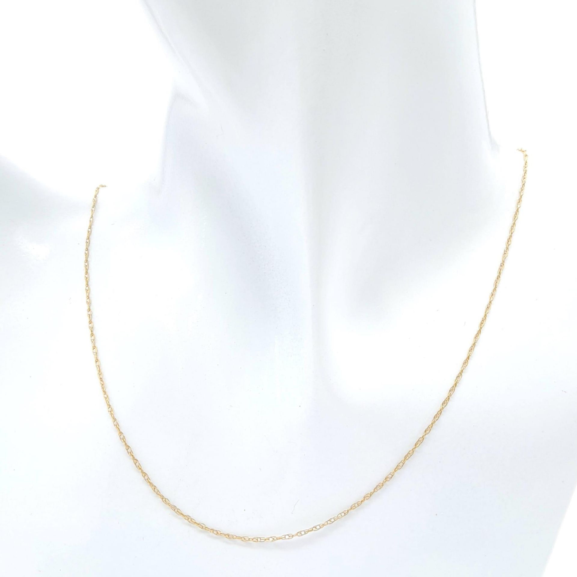 A 9K Yellow Gold Disappearing Necklace. 48cm length. 0.75g weight. - Image 2 of 5