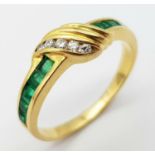 AN 18K YELLOW GOLD DIAMOND & EMERALD RING. Size J, 2.3g total weight. Ref: SC 9052