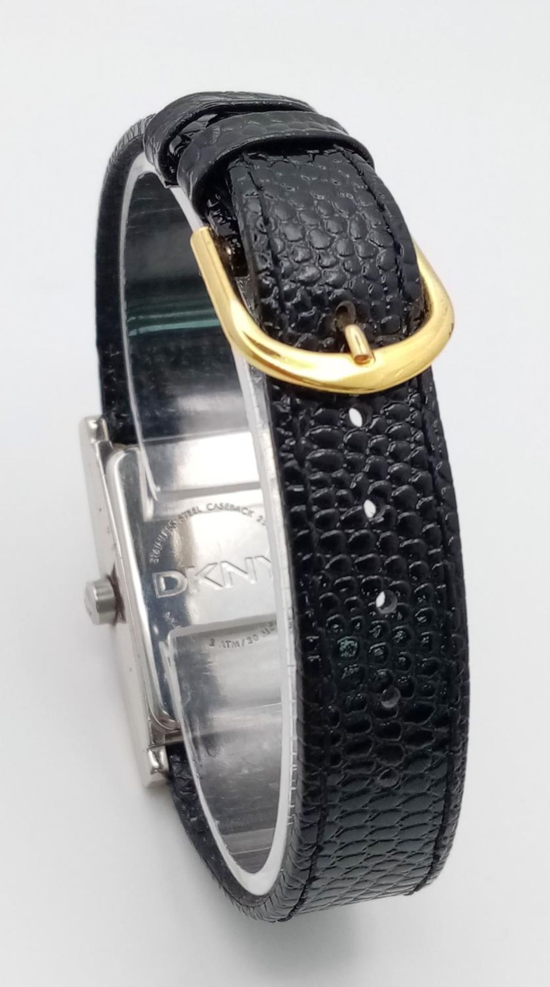 A DKNY Quartz Ladies Watch. Black leather strap. Stainless steel case - 24mm. Analogue/digital dial. - Image 6 of 6