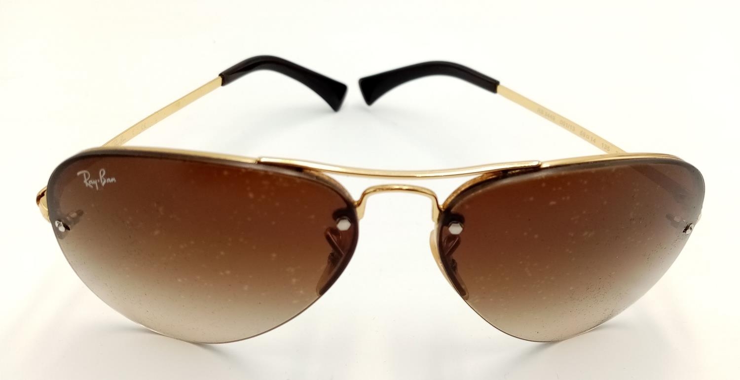 A Pair of Ray.Ban Sunglasses with Case.