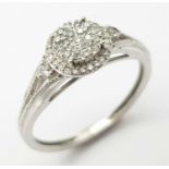 A 9K WHITE GOLD DIAMOND RING 0.15CT 1.8G SIZE K 1/2. SC 9018