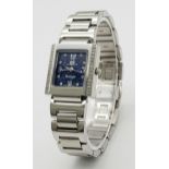 A Bellagio Diamond Ladies Watch. Stainless steel bracelet and case - 25mm. Diamond bezel. Blue