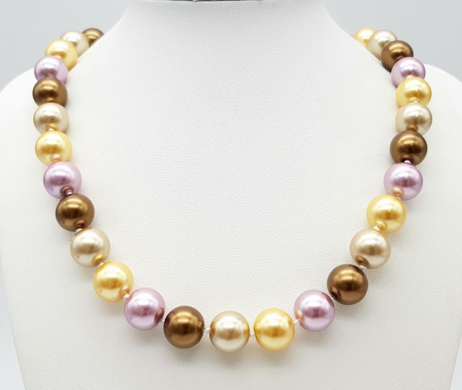 A Vibrant Muti-Coloured South Sea Pearl Shell Necklace. 12mm beads. Heart clasp. Necklace length.