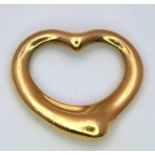 A Tiffany and Co. 18K Yellow Gold Heart Pendant. Tiffany markings. 15 x 15mm. 2g