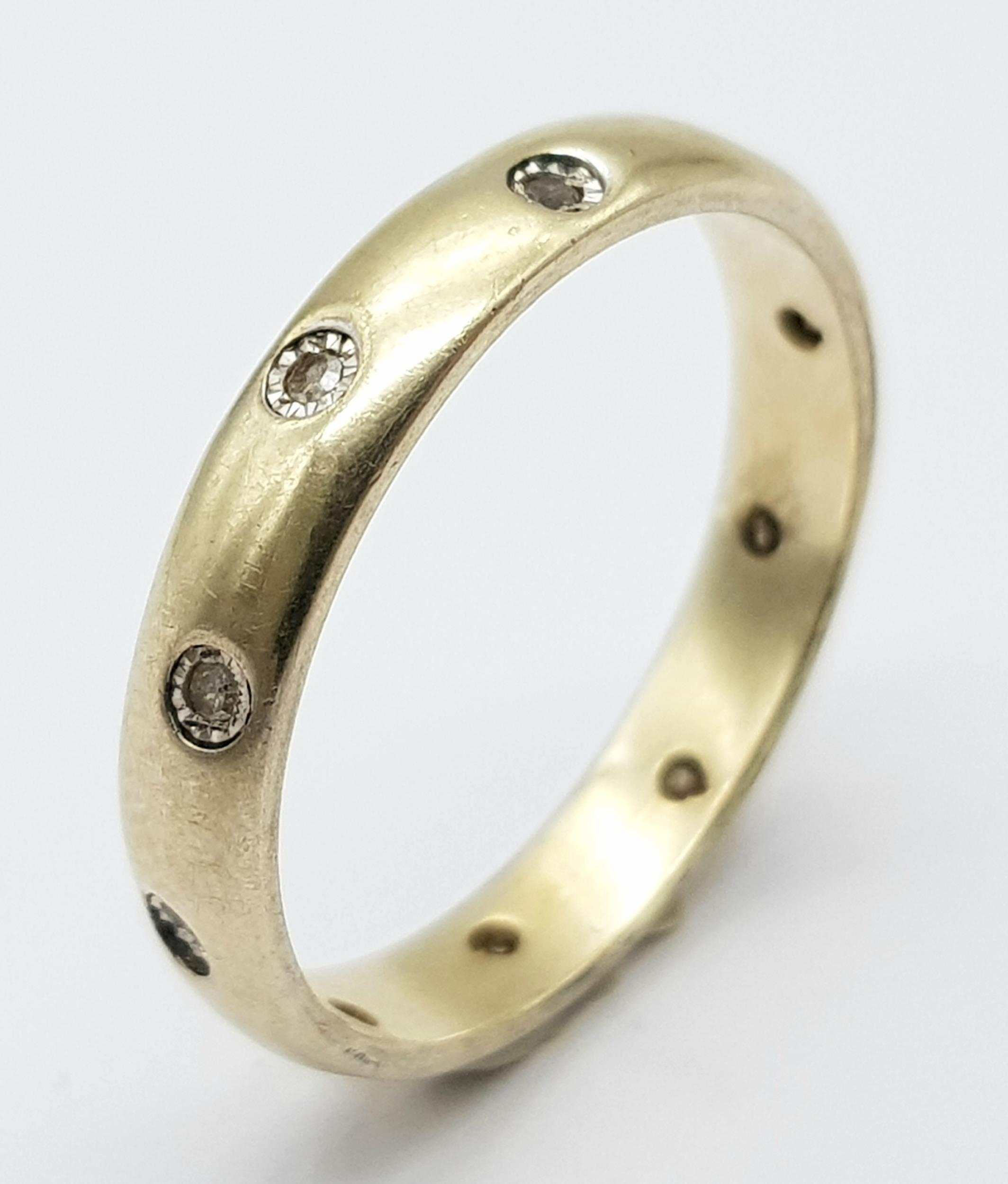 A Gilded 925 Silver Diamond Set Eternity Ring. Size T.