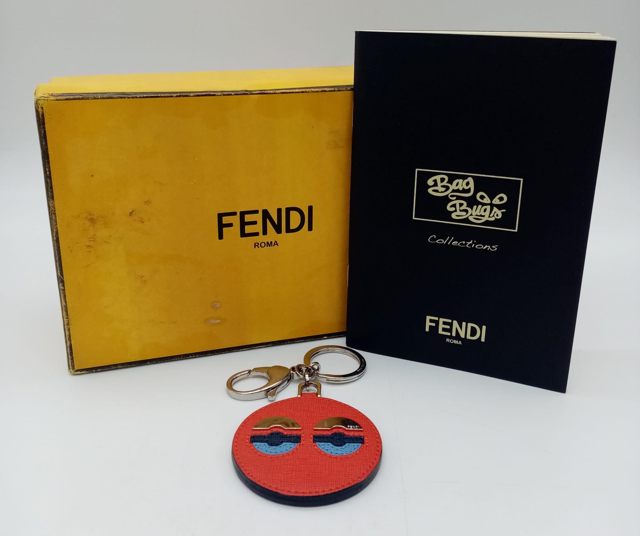 A red leather Fendi monster keychain, silver tone hardware. Diameter6cm. Comes with box. ref:16444 - Image 5 of 5