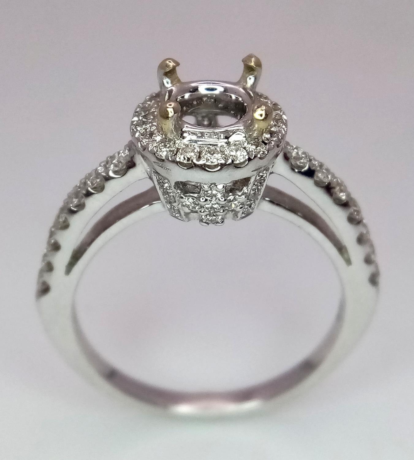 AN 18K WHITE GOLD DIAMOND HALO SOLITAIRE RING MOUNT WITH DIAMOND SET SHOULDERS. Ready to set your - Image 2 of 8