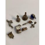 Selection of vintage SILVER CHARMS. To include Lighthouse, Metro car, Train engine, Stork,Sea lion,