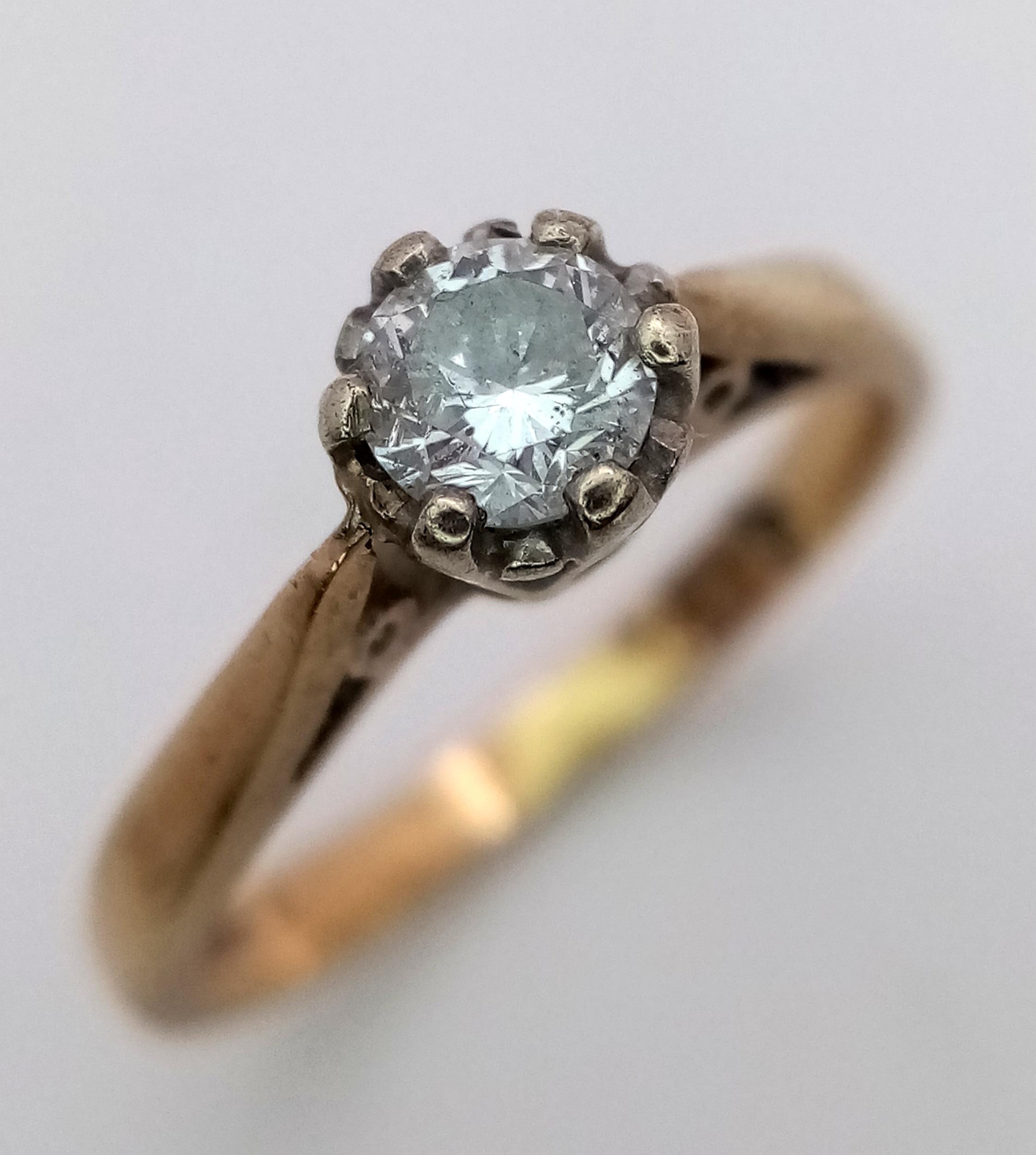 A 9K Yellow Gold Diamond Solitaire Ring. 0.25ct diamond. Size J. 2g total weight.