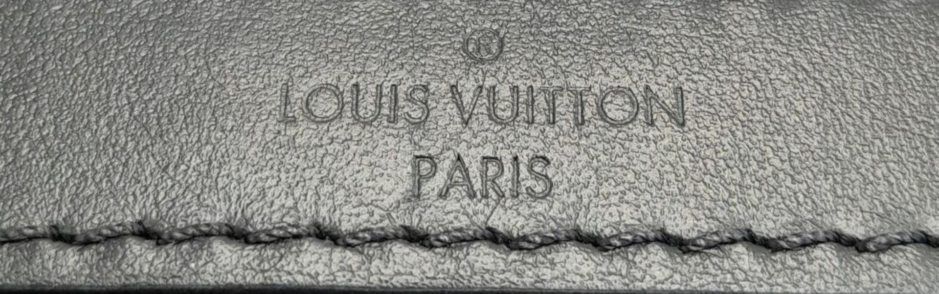 A Louis Vuitton Black Eclipse Trunk Messenger Bag. Monogramed canvas exterior with black-toned - Image 9 of 10