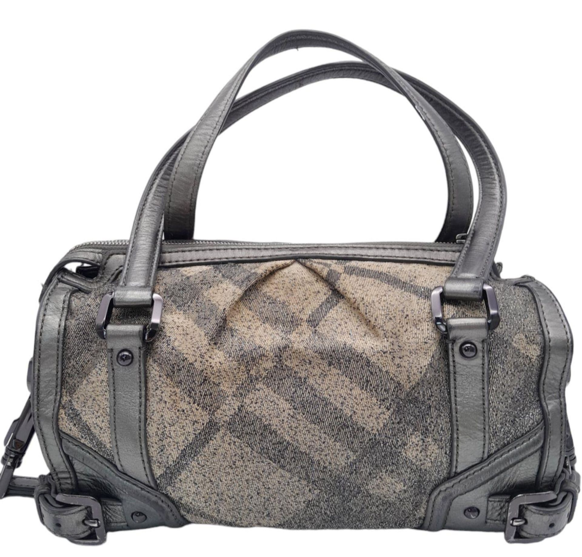 A Burberry Metallic Grey Smoke Check Bag. Canvas exterior with leather trim, leather straps, black- - Image 2 of 9