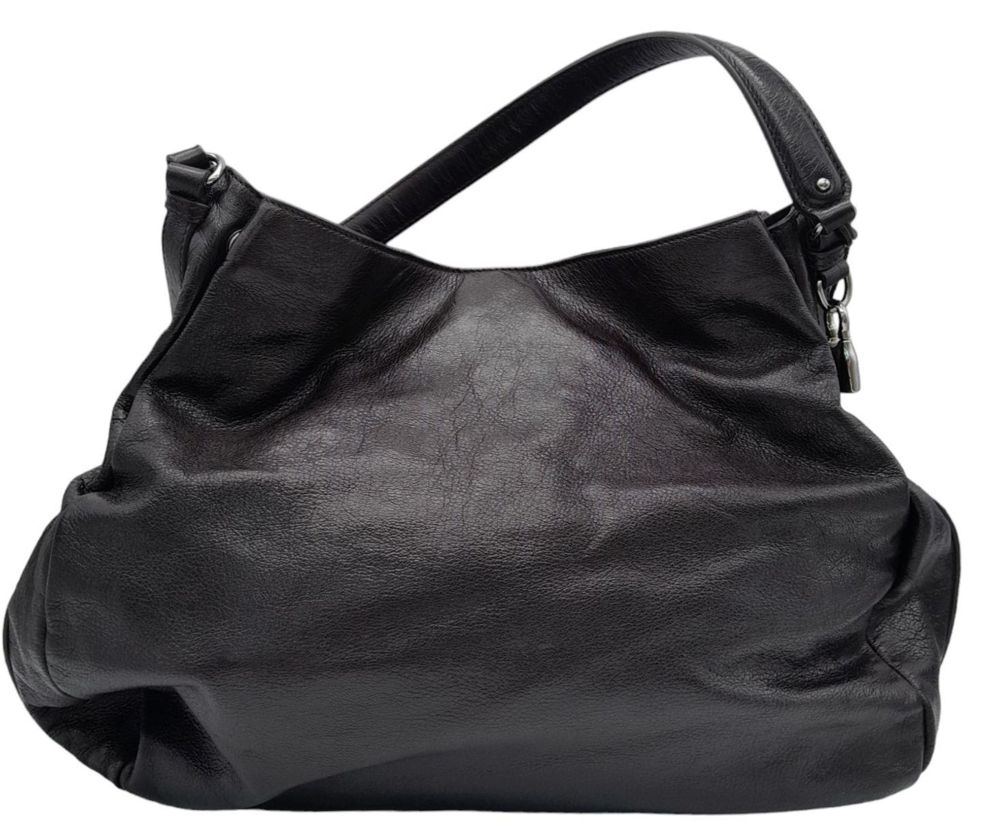 A Celine Dark Brown Shoulder Bag. Leather exterior with silver-toned hardware, single strap, press - Image 2 of 10