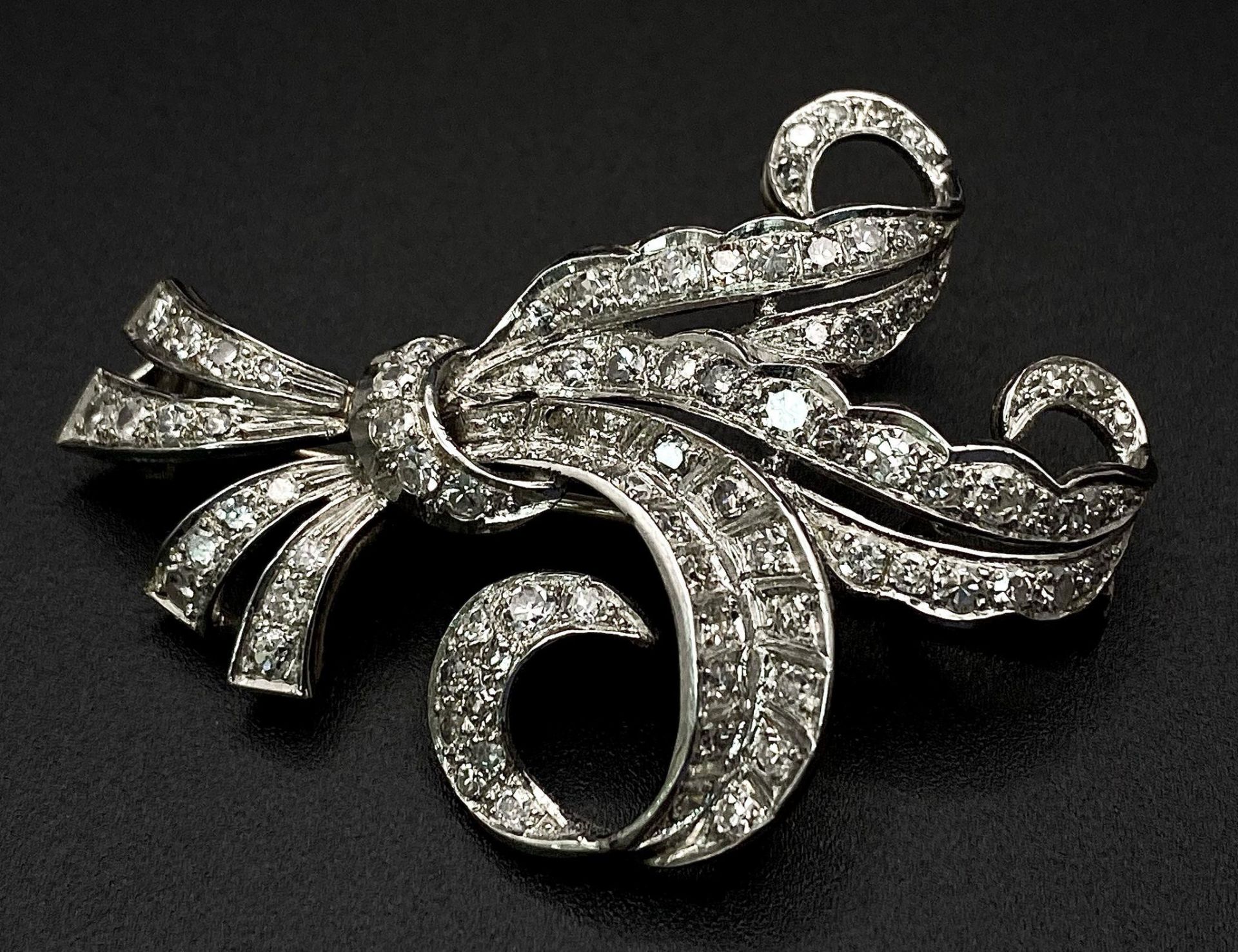 A Vintage Style Platinum and Diamond Elaborate Bow Brooch. 2.2ctw of encrusted diamonds. 10.7g total - Image 8 of 8