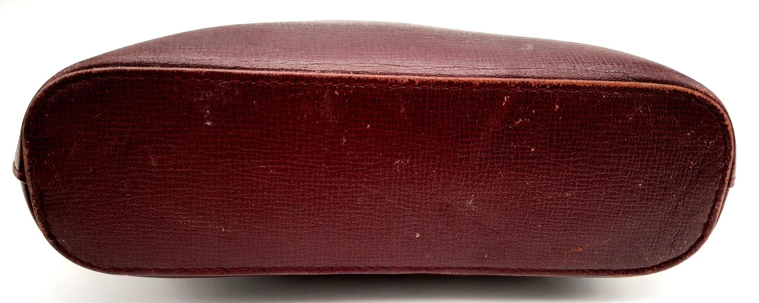 A Vintage Cartier Burgundy Pouch. Leather exterior with zip top closure. Burgundy canvas interior. - Image 5 of 11