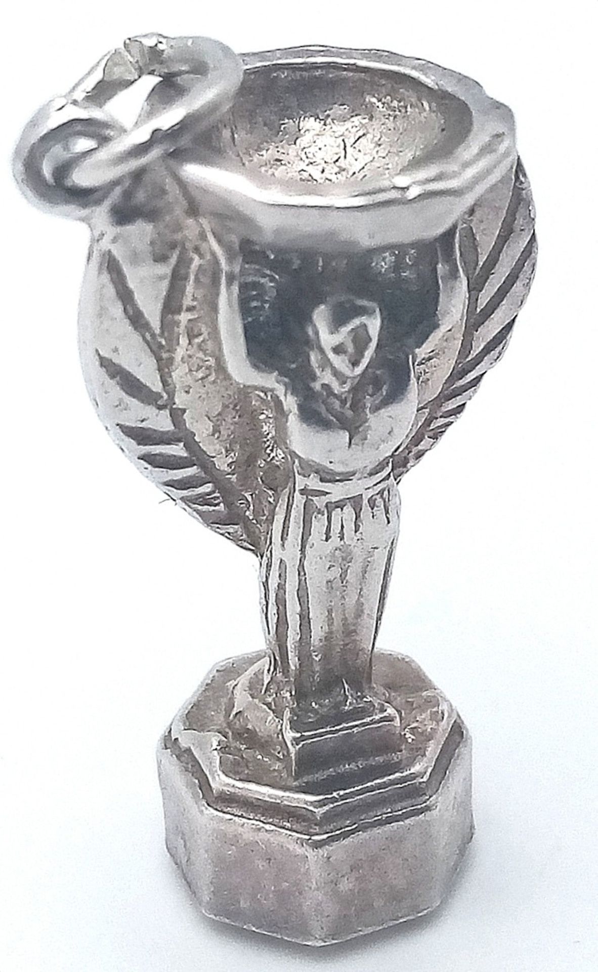 A STERLING SILVER JULES RIMET WORLD CUP TROPHY CHARM. 3cm length, 4.7g weight. Ref: SC 8101
