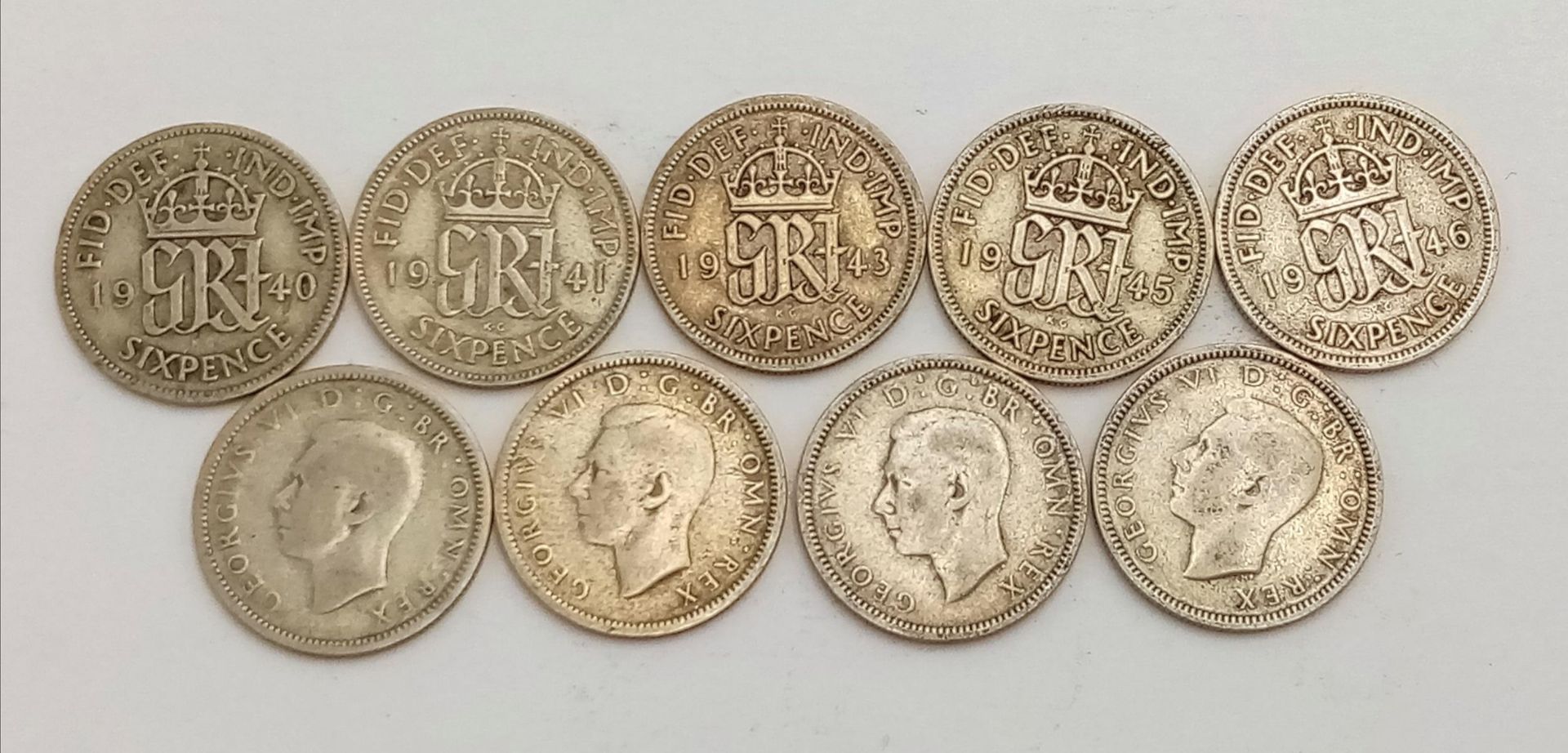 A Parcel of 24 Pre-1947 Silver Sixpences. Comprising 9 x 1946 and 15 x WW2 Dates. 66.08 Grams. - Bild 2 aus 2