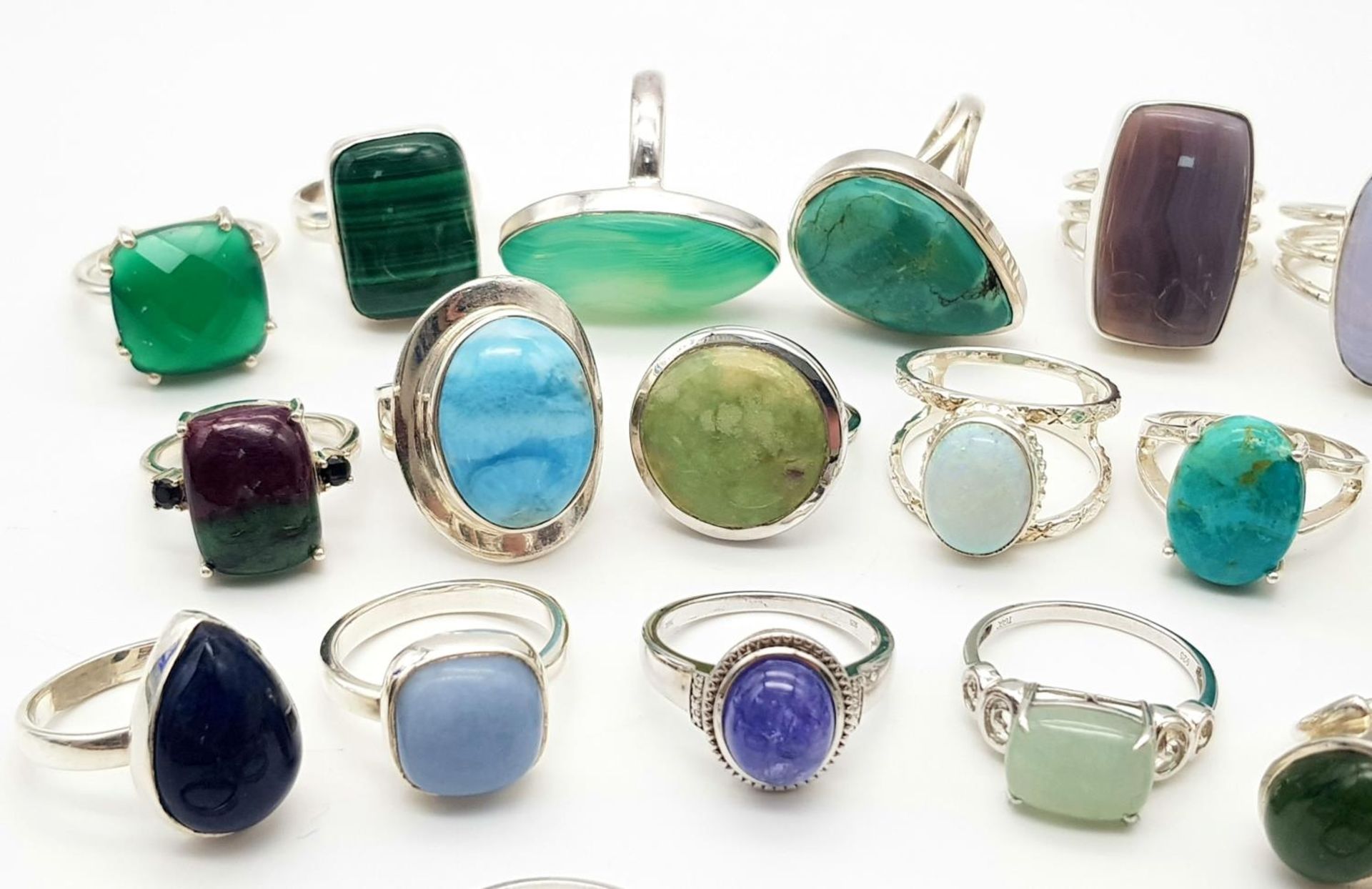 An impressive collection of forty sterling silver rings in a variety of designs. all adorned with - Image 3 of 7