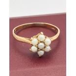 Vintage 9 carat GOLD RING Set with seed pearls in flower formation. Full UK Hallmark. Complete