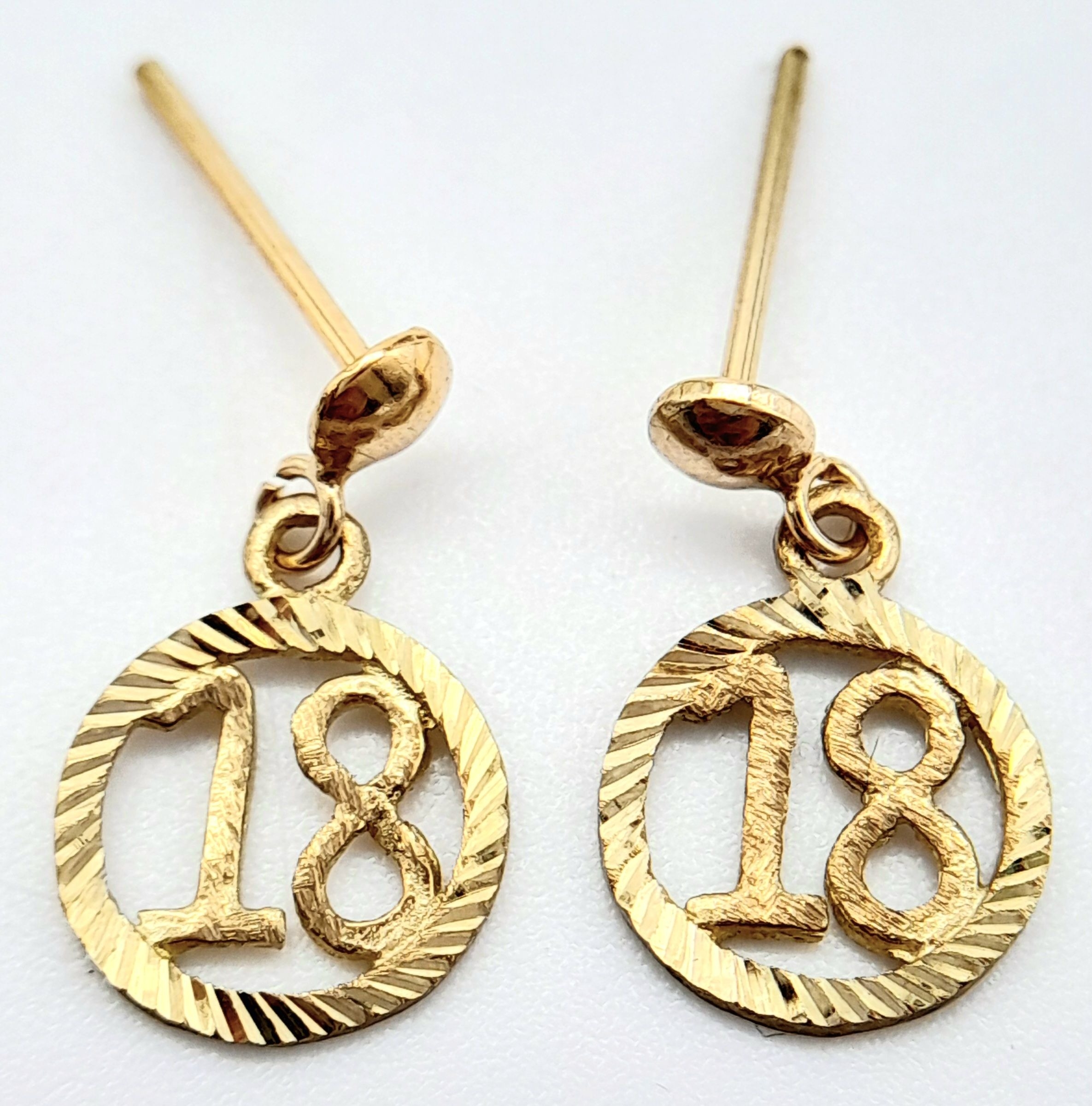 A 9ct Yellow Gold ’18’ circle earrings, 0.7g weight, approx 14mm x 8mm. ref: SH1479I
