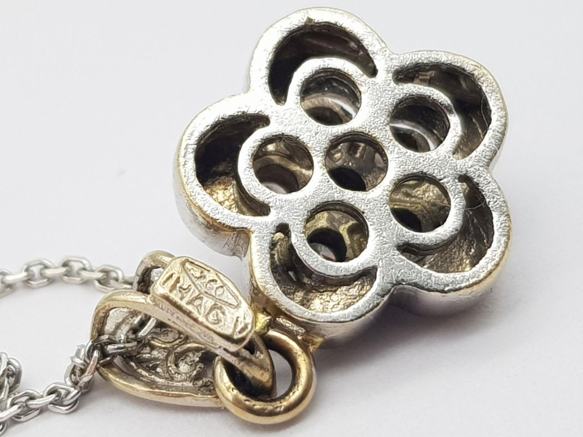 A 18ct White Gold Diamond Flower Necklace, 0.12ct diamond, 18” length, 12mm x 12mm pendant , 4.3g - Image 4 of 5