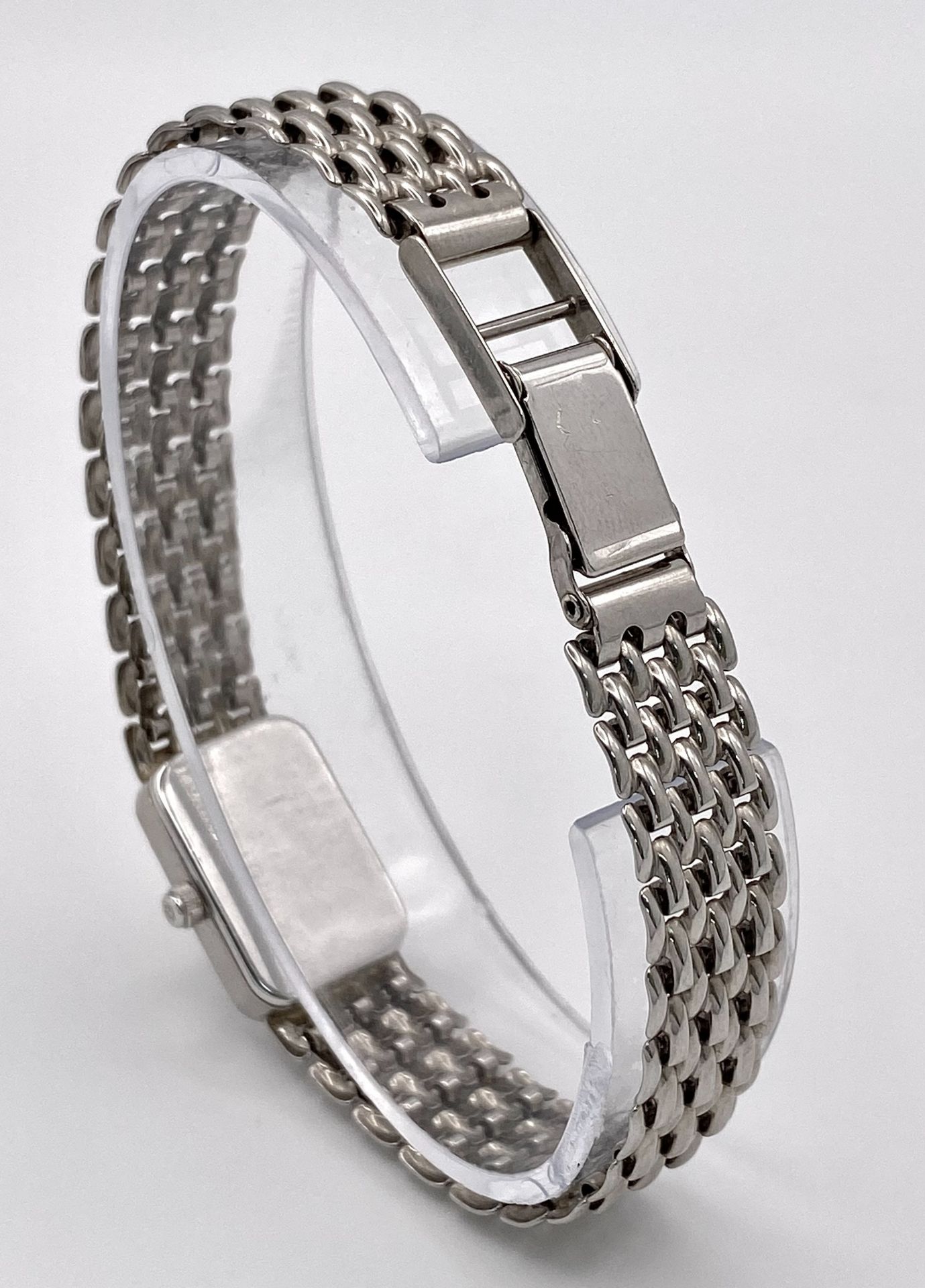 A 9K White Gold Sovereign Quartz Watch. 9K gold bracelet and case - 13mm. White dial. Diamond bezel. - Image 5 of 6
