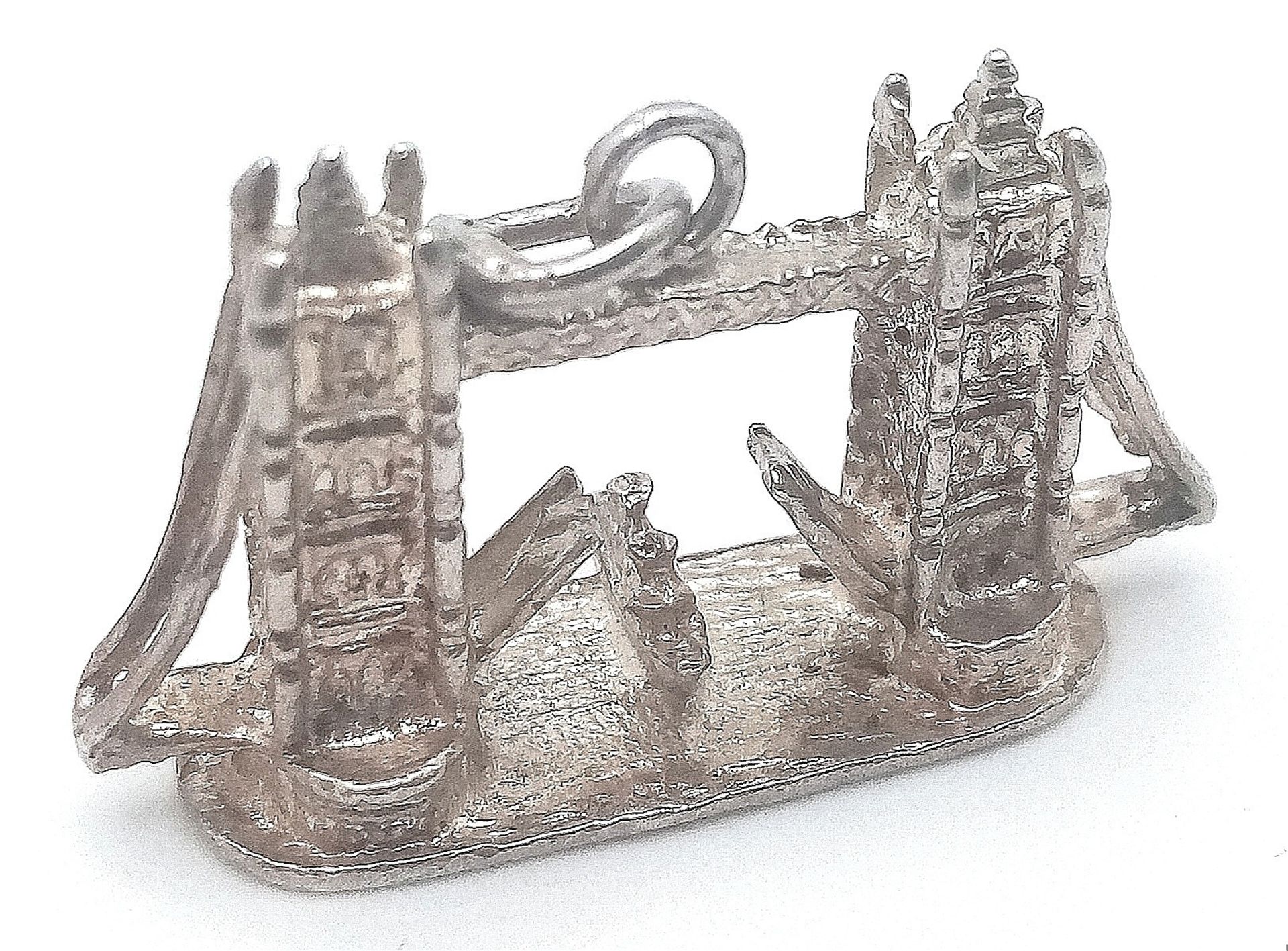 A STERLING SILVER LONDON THEMED TOWER BRIDGE CHARM/PENDANT. 3cm x 2.1cm, 6.5g weight. Ref: SC 8102